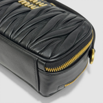 Miu Miu Matelassé Top-Handle Bag — Black